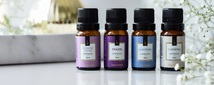 A imagem apresenta quatro produtos de 100 ML das linhas Via Aroma